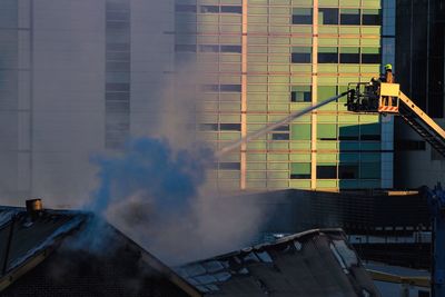 People working on building