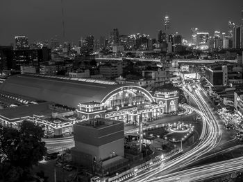 High angle view of illuminated buildings in city at night