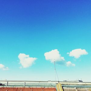 Low angle view of built structure against blue sky