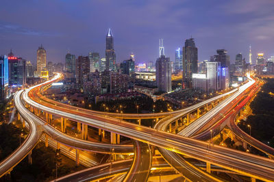 High angle view of illuminated city at night