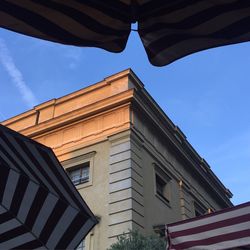 Low angle view of building against blue sky