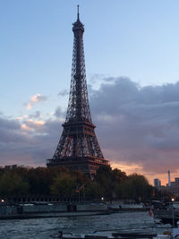 View of tower against cloudy sky