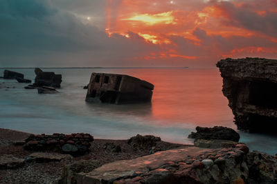 Scenic view of sea against sky during sunset