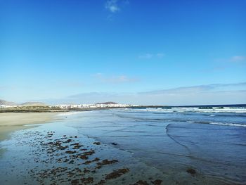 Scenic view of sea against sky during winter