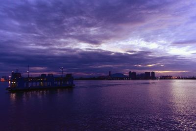 City lit up at dusk