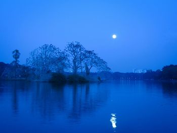 Scenic view of lake against blue sky