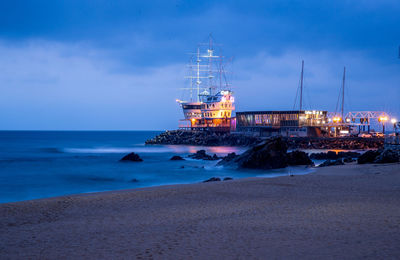 Scenic view of sea against sky at dusk