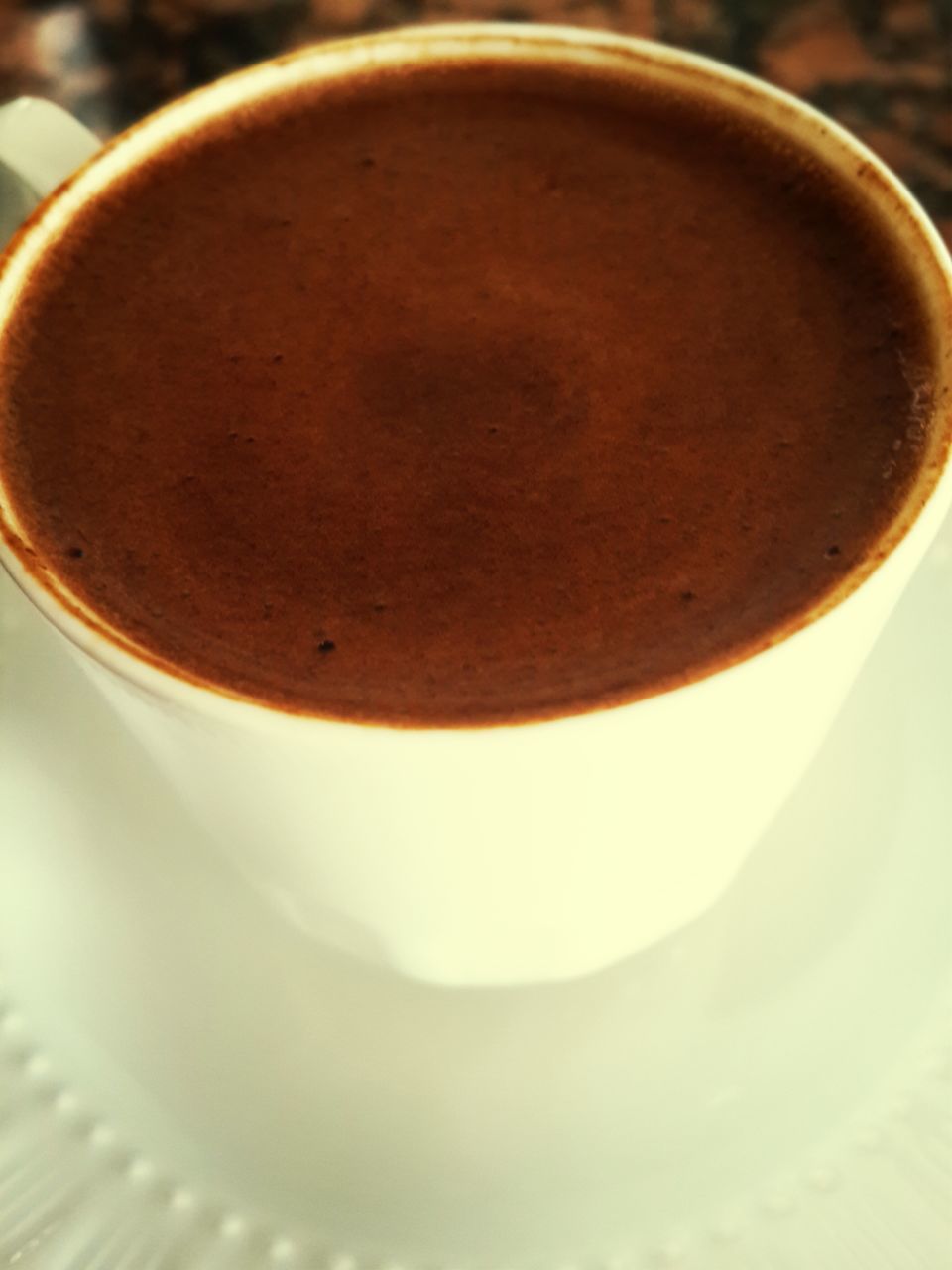 food and drink, coffee cup, drink, refreshment, coffee - drink, indoors, table, freshness, still life, close-up, coffee, saucer, frothy drink, cup, high angle view, cappuccino, spoon, focus on foreground, selective focus, no people