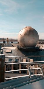 Beautiful building next to the danube river, planetarium on top, panoramic view of budapest city