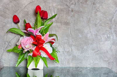 Close-up of rose plant on table