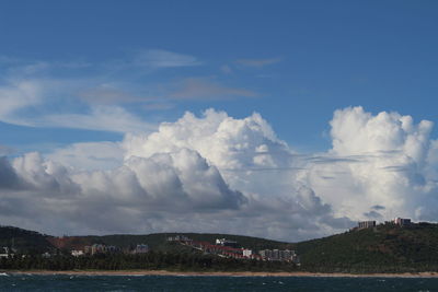 Scenic view of landscape against cloudy sky