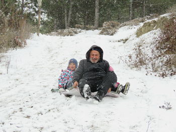Portrait of smiling girl in snow