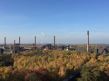 View of landscape against blue sky