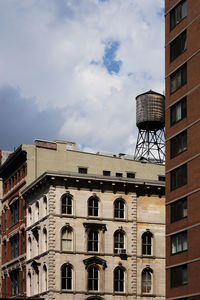 Low angle view of buildings against sky