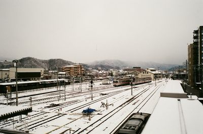 High angle view of railroad tracks against sky during winter