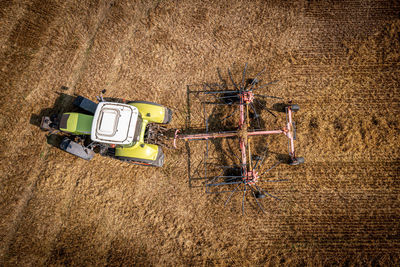 Directly above shot of vintage car on field