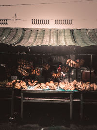 People working at market stall