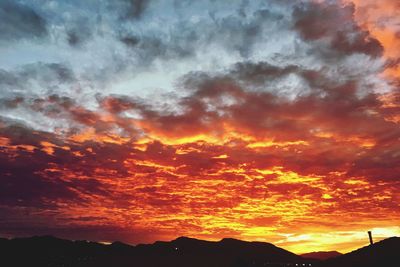 Scenic view of dramatic sky during sunset