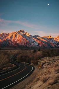 Scenic view of mountains against sky at night