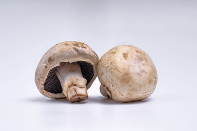 Close-up of fruits against white background