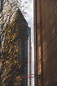 Low angle view of modern buildings against sky