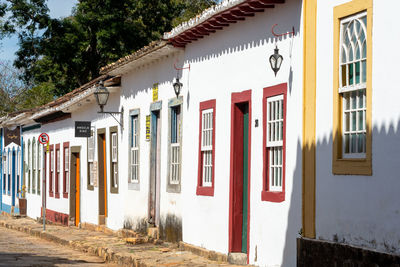 Residential buildings by street in city