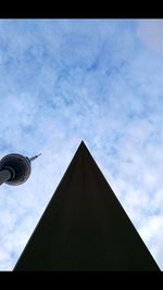 High section of building against cloudy sky