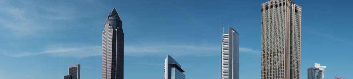 Low angle view of modern buildings against sky