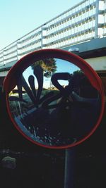 Close-up of wheel against the sky