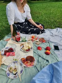 High angle view of man sitting on field