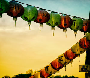 Low angle view of clothes hanging against sky