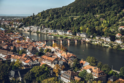 High angle view of river amidst buildings in town