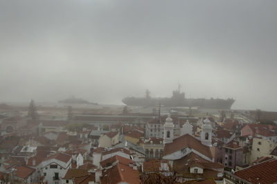 High angle shot of townscape against sky