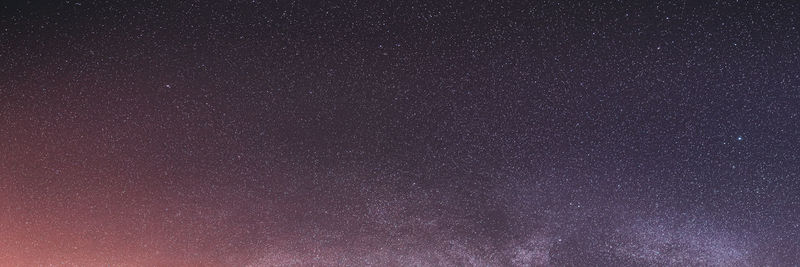 Low angle view of stars against sky at night