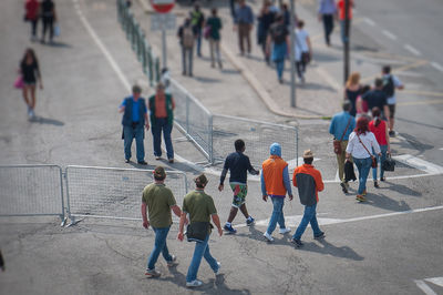 High angle view of people walking on street