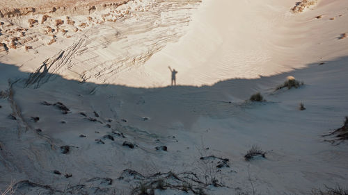 High angle view of person on sand at beach