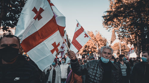 Group of people against the sky