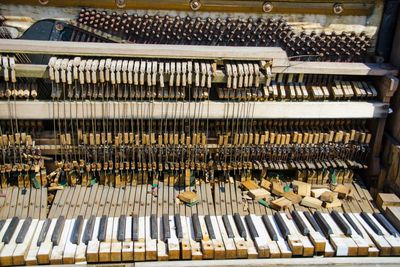 Close-up of abandoned piano