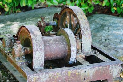 High angle view of rusty machine part