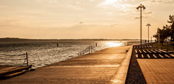 View of pier at sunset