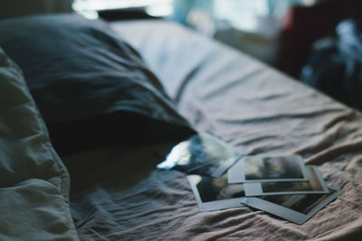 Close-up of man relaxing on bed