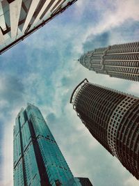 Low angle view of modern buildings against sky