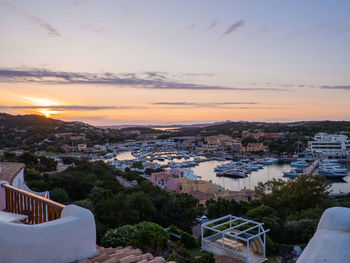 High angle view of townscape against sky at sunset