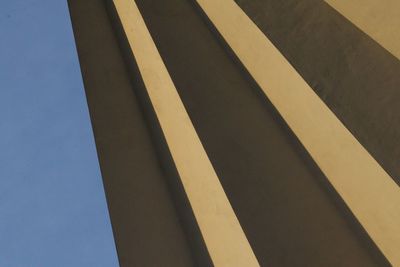 Low angle view of building against blue sky