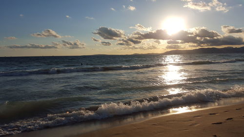 Scenic view of sea at sunset