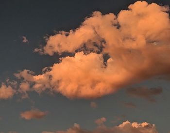 Low angle view of clouds in sky during sunset