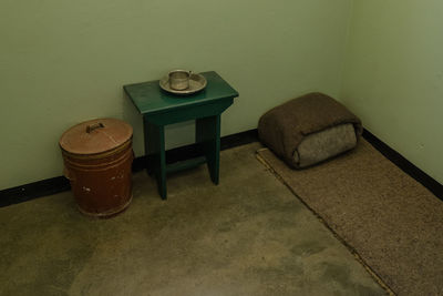 High angle view of empty chairs on table