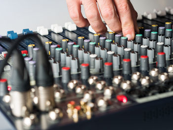 Close-up of man playing sound mixer