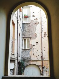 View of building seen through door