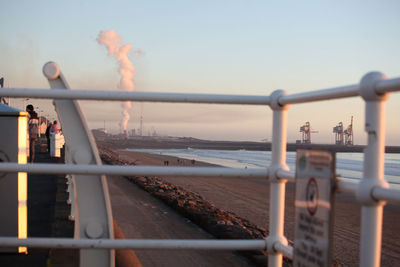 Aberavon seafront with the steelworks and dock in the background.